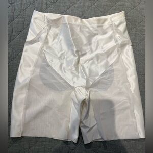 SPANX white booty lifting mid-thigh shorts